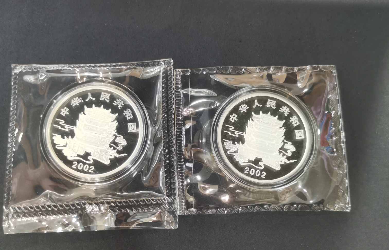 【029070】2002年中国民间神话故事二组1盎司彩银币两枚一套