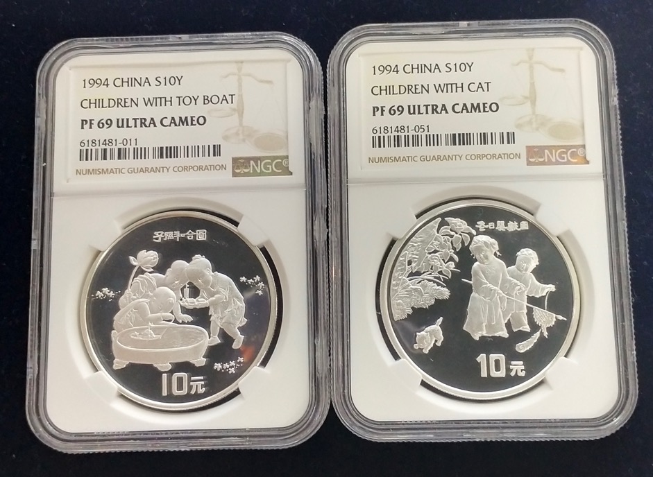 【949160】1994年中国古代名画系列（婴戏图）金银纪念币1盎司圆形银质纪念币两枚一套